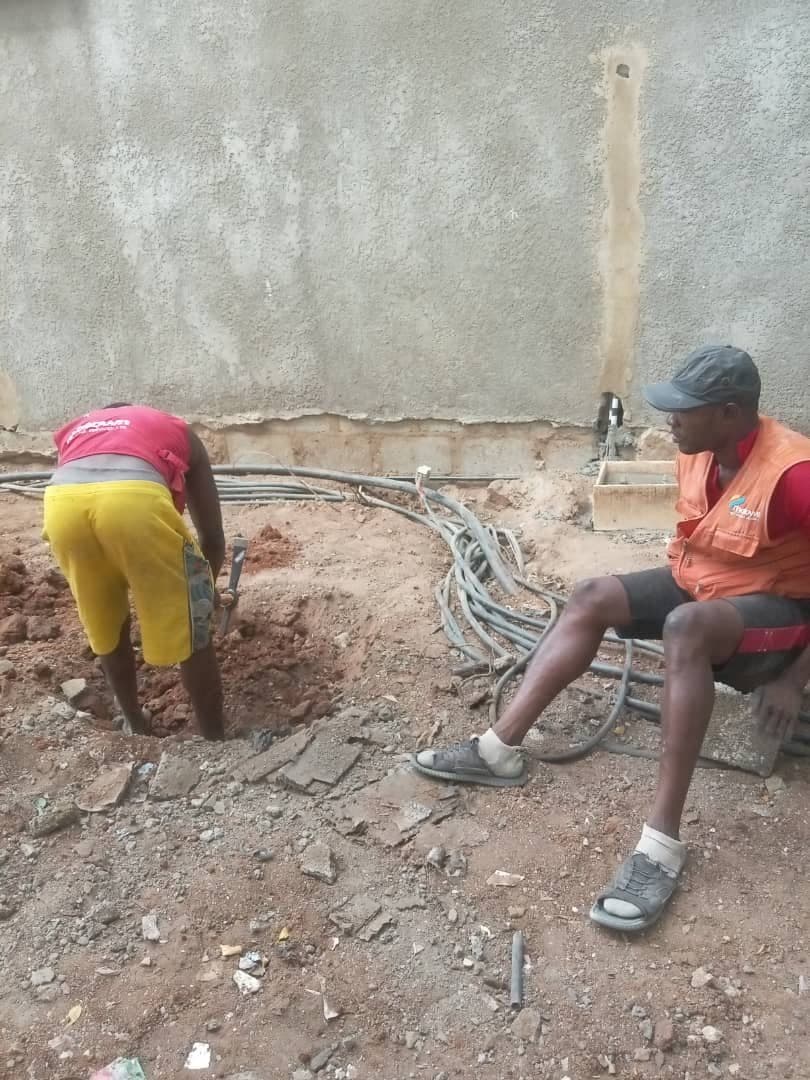 Laying cable in an excavated route