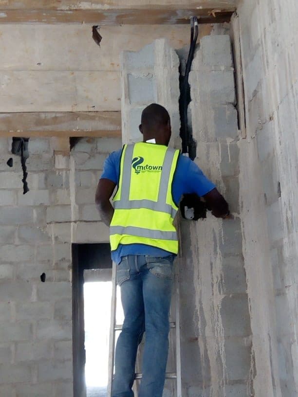 Containment routed at a structural column