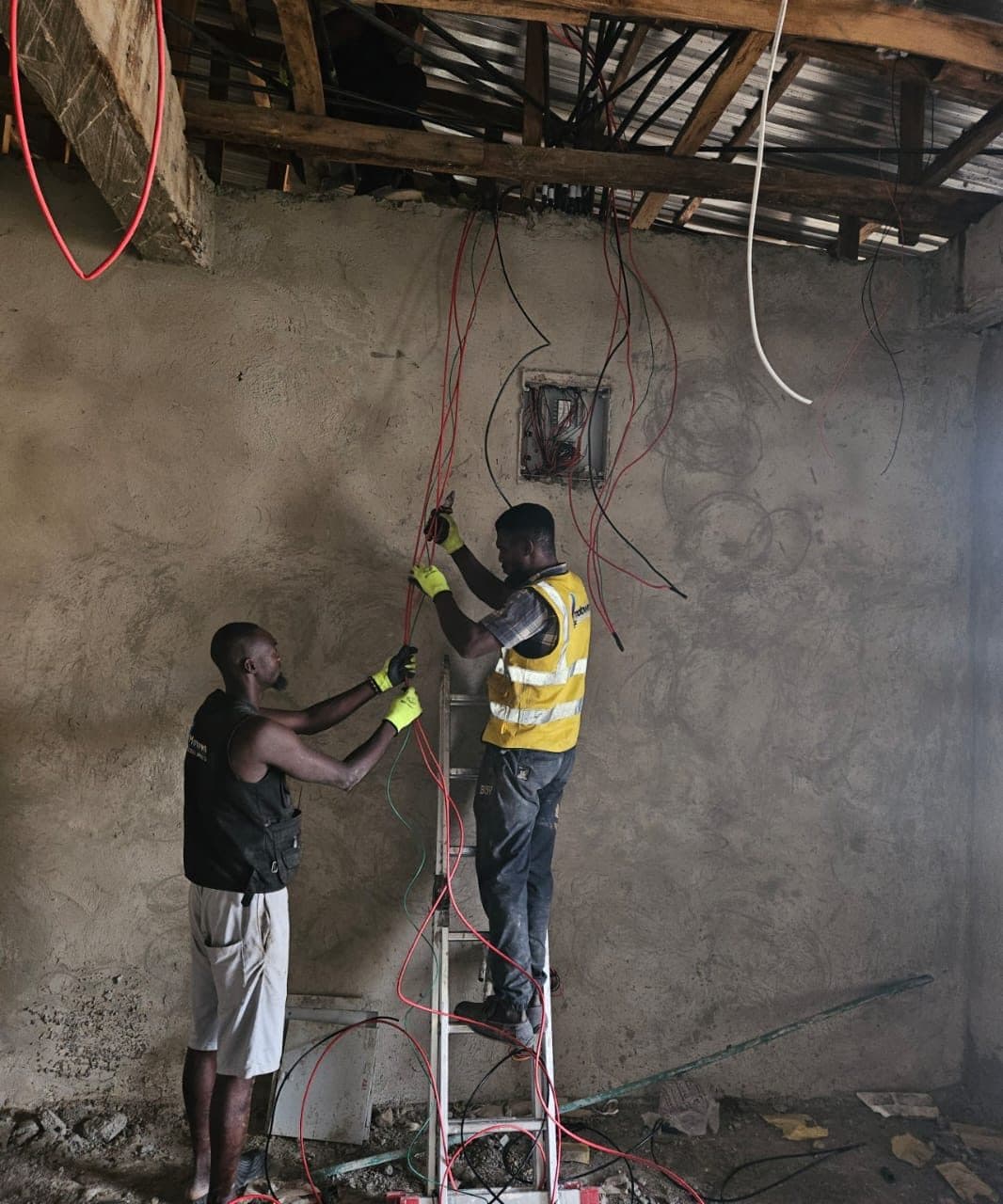 Two-man wiring at a recessed box